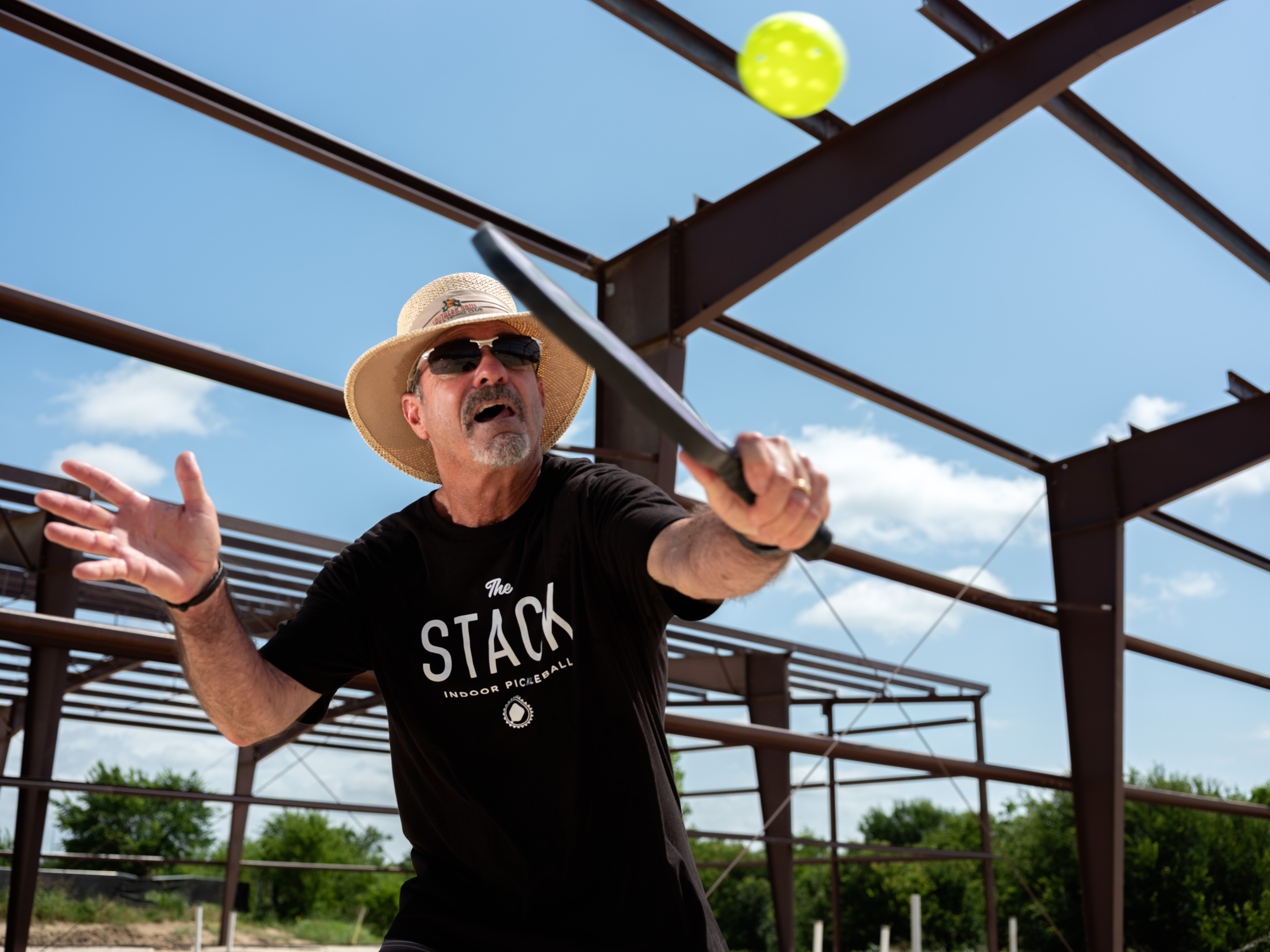 Ernie playing pickleball at The Stack construction site