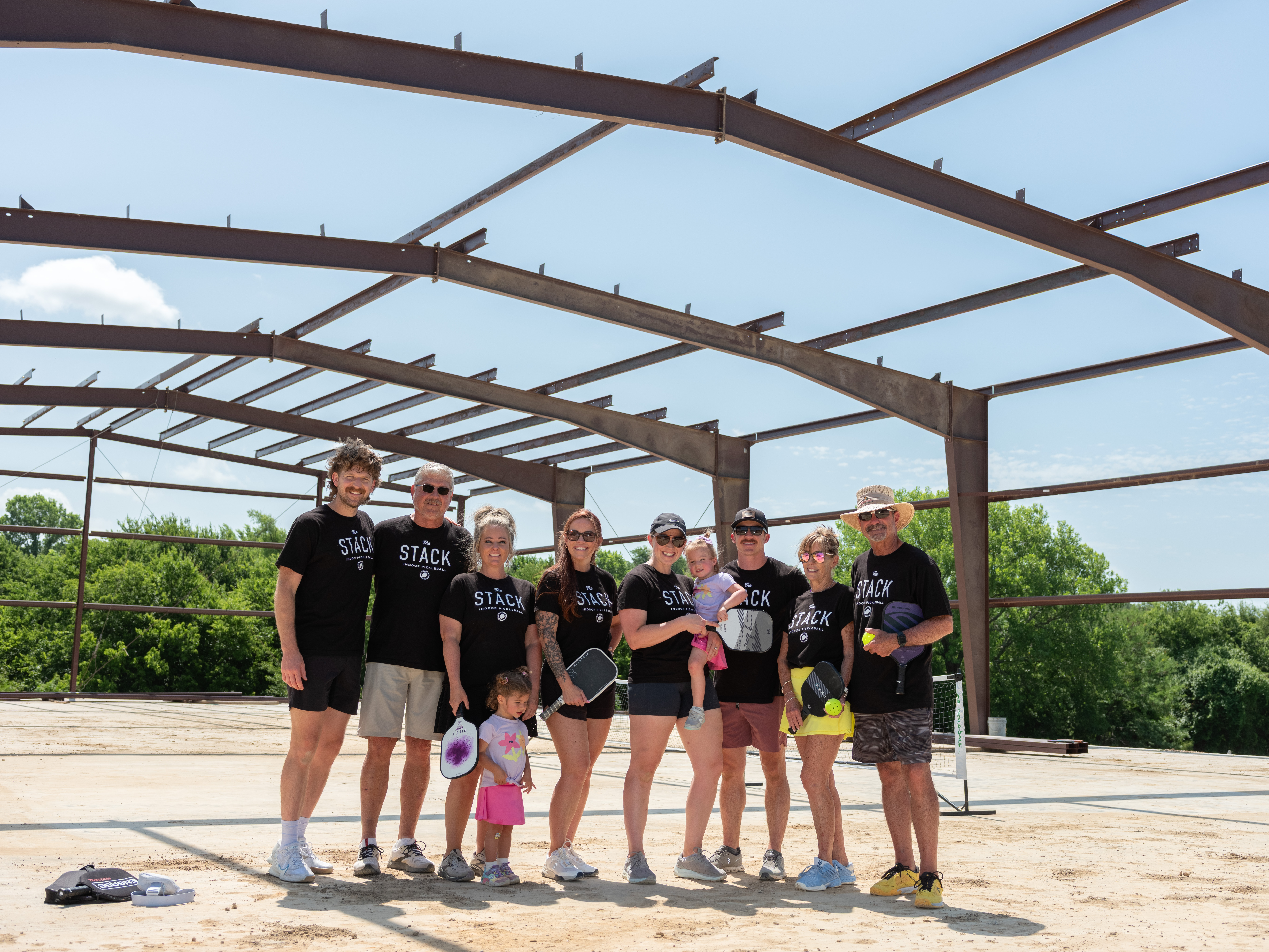 Family playing pickleball at The Stack